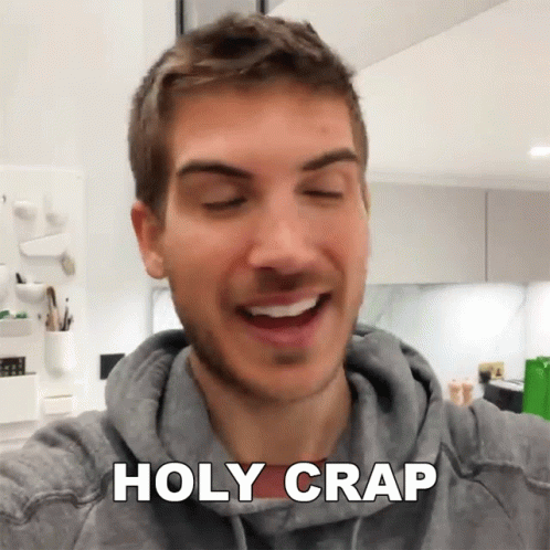 Man in Grey Hoodie Saying Holy Crap