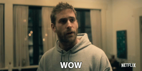 Man In Grey Hoodie Saying Wow GIF