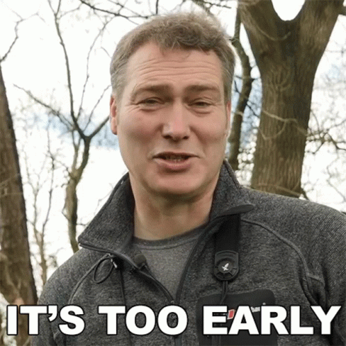 Man in Grey Jacket Saying It's Too Early