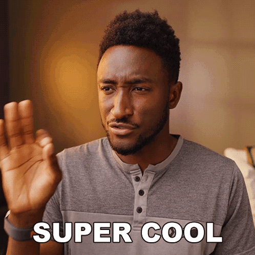 Man in Grey Shirt Says Super Cool