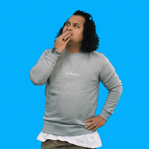 Man in Grey Spooky Sweatshirt Pointing Up