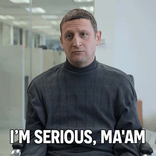 Man in Grey Sweater Saying Im Serious Ma'am