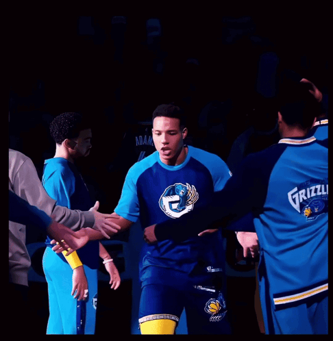 Man In Grizzlies Jersey Shaking Hands GIF