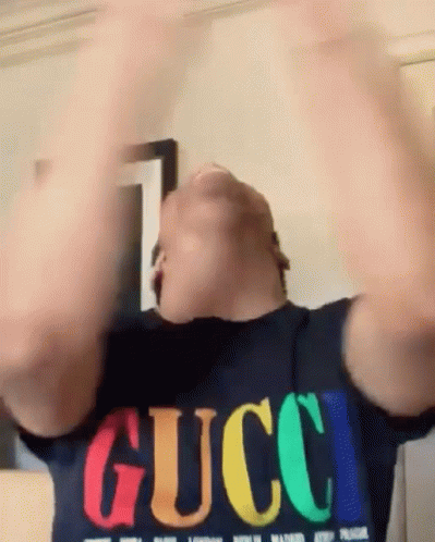 Man In Gucci T-Shirt Arms In Air GIF
