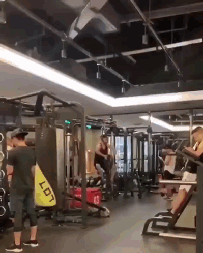 Man in Gym with Bag Saying Lot