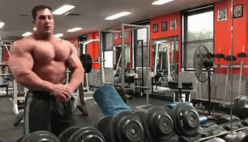 Man In Gym With Dumbbells GIF