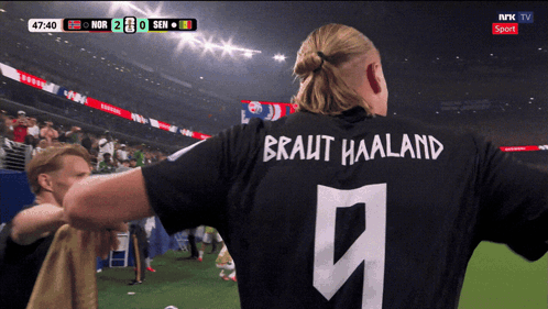 Man In Haaland Jersey On Field GIF