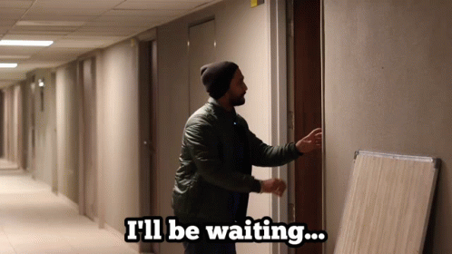 Man In Hallway I'll Be Waiting GIF
