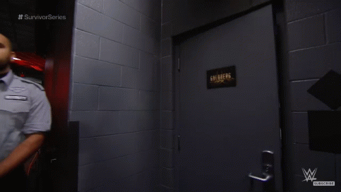 Man in Hallway With Survivor Series Text