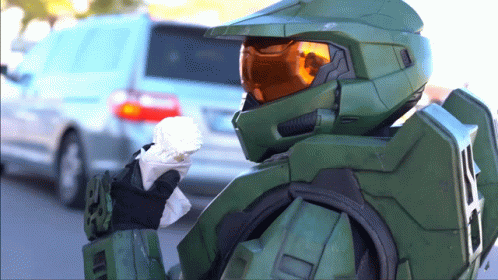 Man In Halo Helmet Holding Paper GIF