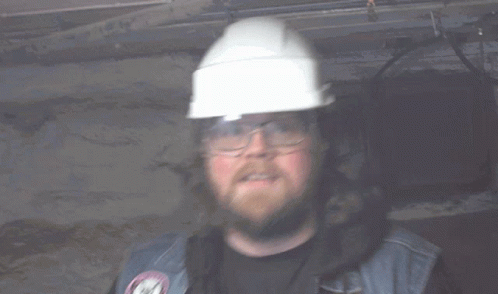 Man in Hard Hat and Gloves Safety First