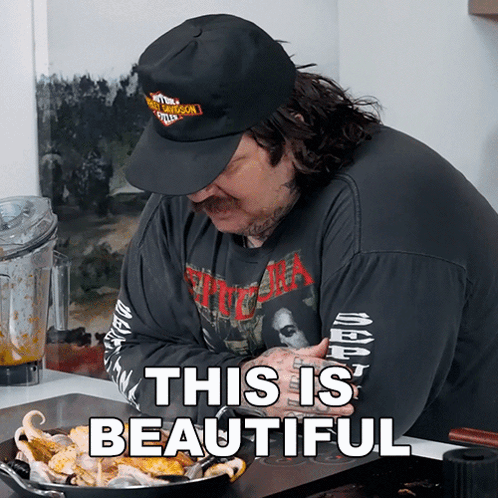 Man in Harley Davidson Hat Cooking