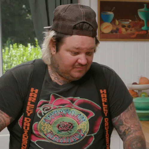 Man In Harley Davidson T-Shirt And Suspenders GIF