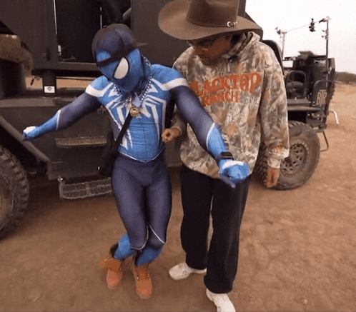 Man in Hat and Apocalypse Army Hoodie