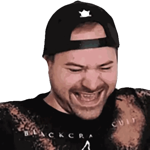Man in Hat and Black Shirt Laughing