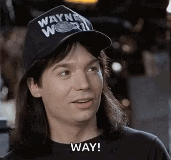 Man in Hat and Black Shirt Saying Way