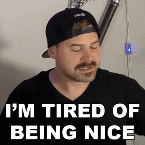 Man in Hat and Black Shirt Says I'm Tired of Being Nice
