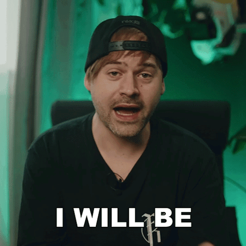 Man in Hat and Black Shirt Says I Will Be