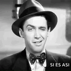 Man in Hat and Bow Tie Making Funny Face