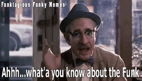 Man in Hat and Bow Tie Talking