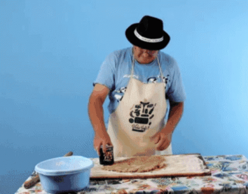 Man in Hat and Coca Cola Apron