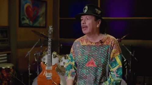 Man In Hat And Colorful Shirt With Guitar GIF