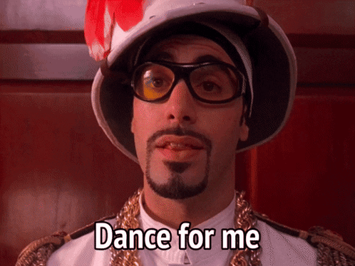 Man in Hat and Glasses Says Dance for Me