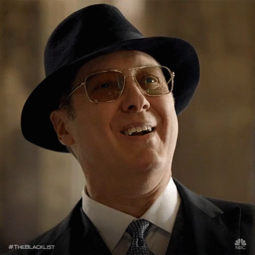 Man In Hat And Glasses Smiling #Theblacklist GIF