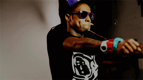 Man in Hat and Glasses Smiling Weezy Baby