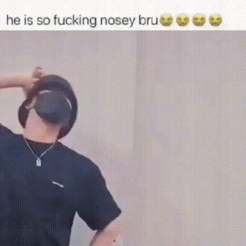Man in Hat and Headphones Making Funny Face