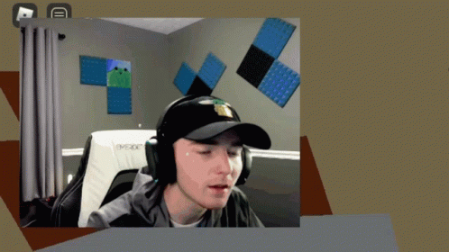 Man in Hat and Headphones on Evoxx Chair
