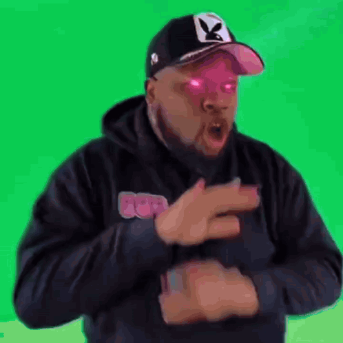 Man In Hat And Hoodie Making Funny Face GIF