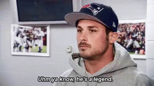 Man In Hat And Hoodie Talking Football GIF