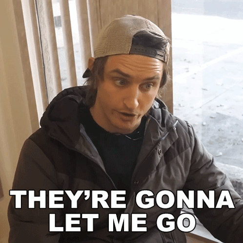 Man In Hat And Jacket Saying They're Gonna Let Me Go GIF