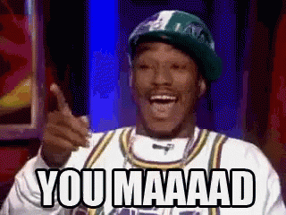 Man in Hat and Jersey Thumbs Up Saying You Maaad