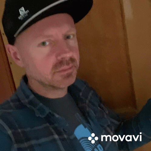 Man in Hat and Plaid Shirt With Movado