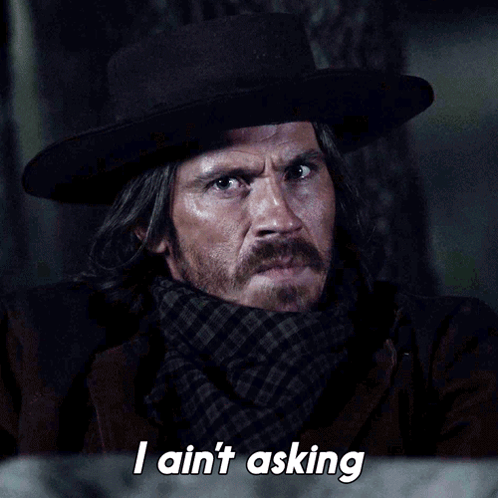 Man in Hat and Scarf Says I Ain't Asking