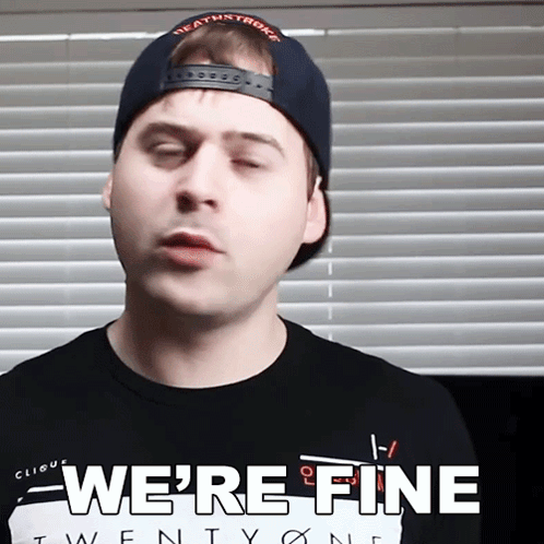 Man in Hat and Shirt Saying We're Fine
