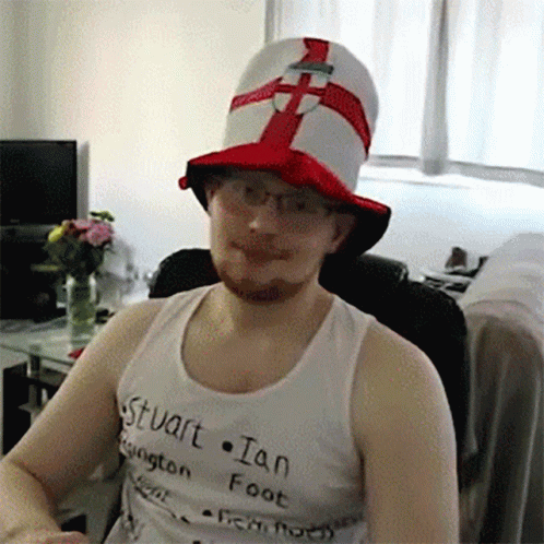 Man in Hat and Stuart Ian Shirt