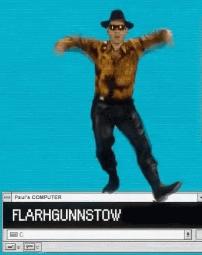 Man in Hat and Sunglasses Dancing at Paul's Computer