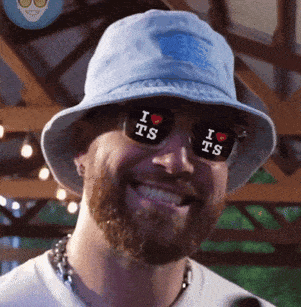 Man in Hat and Sunglasses I Heart Ts