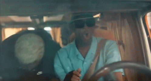 Man In Hat And Sunglasses Making Funny Face GIF
