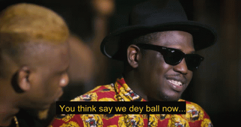 Man in Hat and Sunglasses Saying We Dey Ball