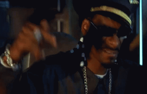 Man In Hat And Sunglasses Sitting GIF