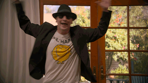 Man in Hat and Sunglasses Wearing Mr Hap Shirt