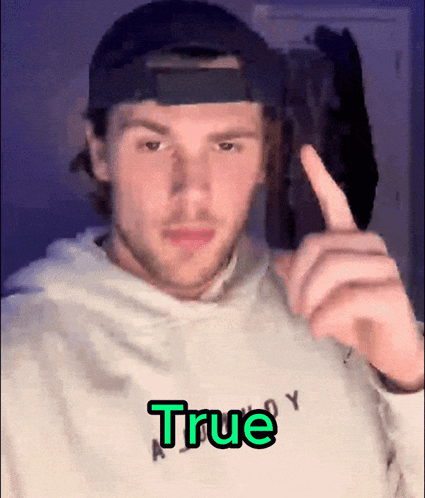 Man in Hat and Sweatshirt Saying True