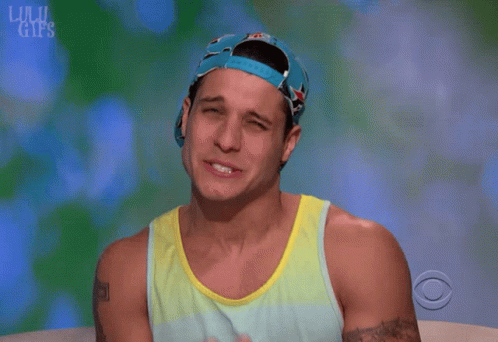 Man In Hat And Tank Top Saying Ouch GIF
