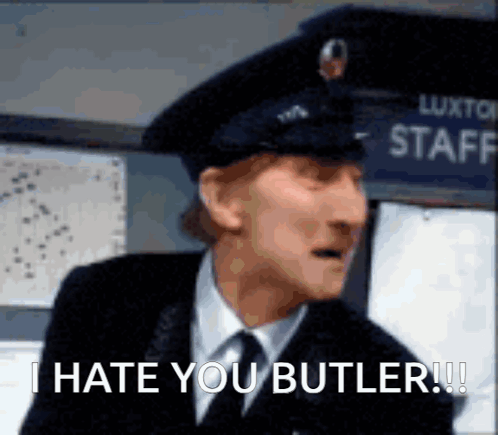 Man in Hat and Tie Says I Hate You Butler