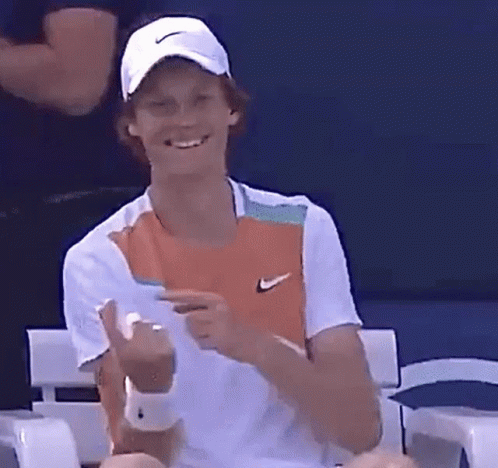 Man In Hat And White Shirt Smiling Pointing GIF