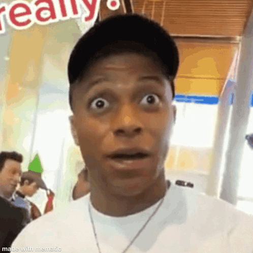 Man In Hat And White T-Shirt Making Funny Face GIF
